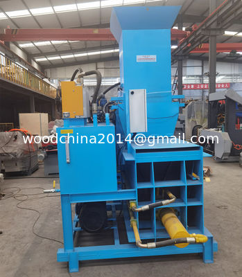 Druckmaschine für das Balen von Holzsägen, Schieberzeugermaschine